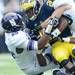Michigan running back Dennis Norfleet is brought down by Northwestern defense in the firs quarter at Michigan Stadium on Saturday. Melanie Maxwell I AnnArbor.com